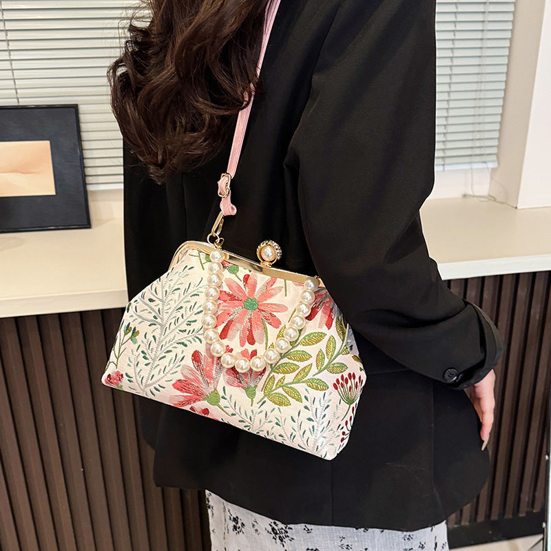 Damen elegante Umhängetasche mit floralem Design und Perlenakzenten Nord Taschen