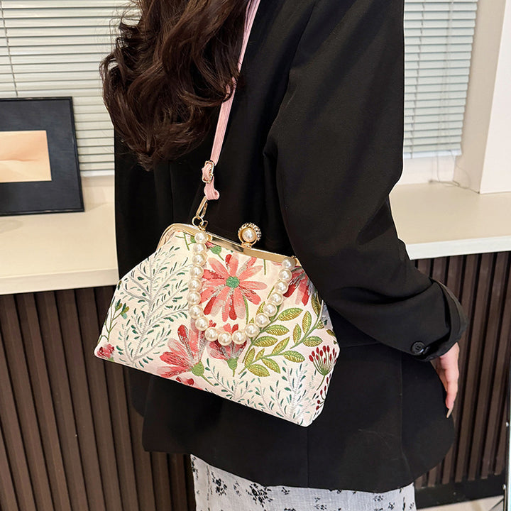 Damen elegante Umhängetasche mit floralem Design und Perlenakzenten Nord Taschen