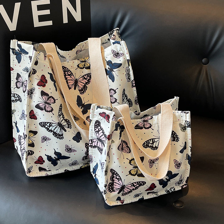 Damen Einkaufstasche mit floralem Schmetterlingsdesign und stabilen Tragegriffen Nord Taschen