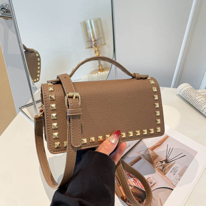 Damen Mini-Handtasche mit glitzerndem Obermaterial und goldenen Nieten Nord Taschen