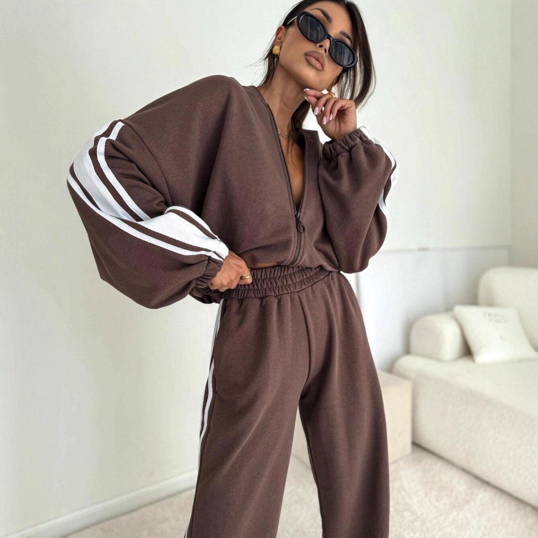 Damen cropped Zip-Hoodie mit voluminösen Ballonärmeln und High-Waist Relaxhose im sportlichen Seitenstreifen-Design Nord Taschen