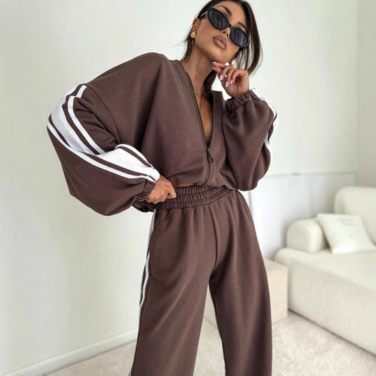 Damen cropped Zip-Hoodie mit voluminösen Ballonärmeln und High-Waist Relaxhose im sportlichen Seitenstreifen-Design Nord Taschen