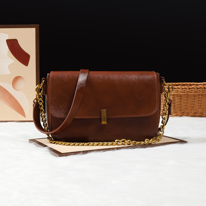 Damen Umhängetasche aus hochwertigem Kunstleder mit elegantem Klappenverschluss Nord Taschen
