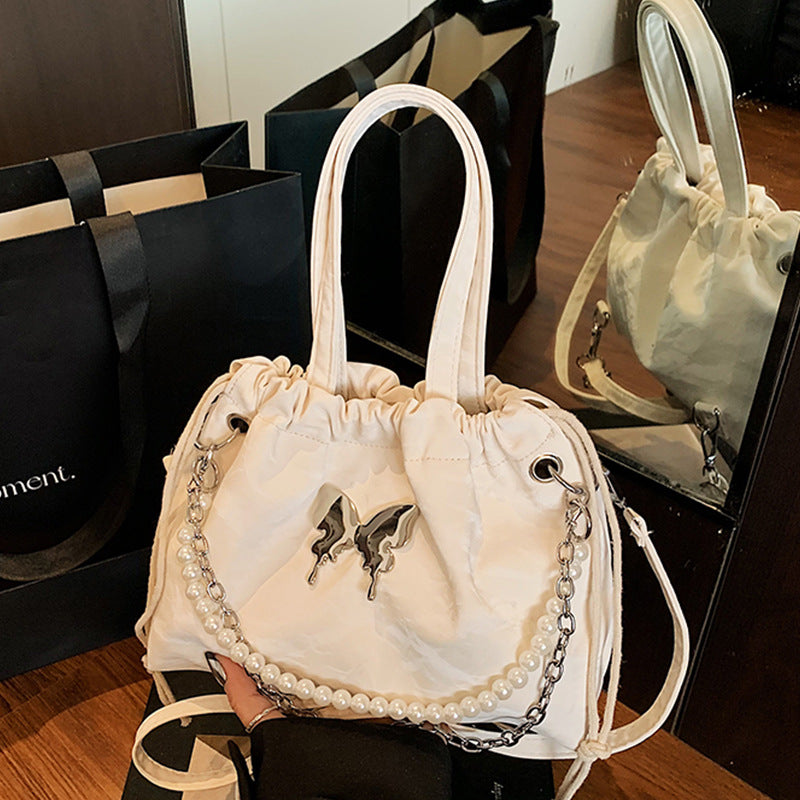 Damen Hobo-Tasche mit dekorativem Ketten- und Perlenbesatz Nord Taschen