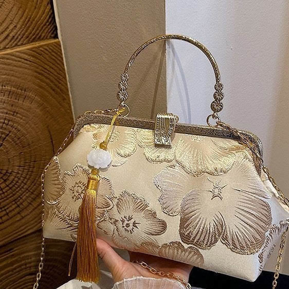 Damen elegante Clutch-Tasche mit floralem Druck und goldenen Akzenten Nord Taschen