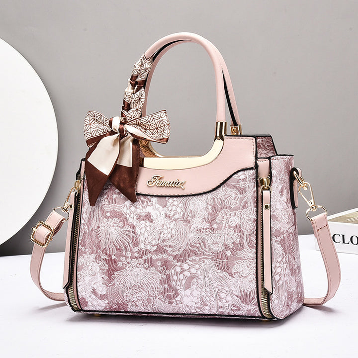 Damen elegante Handtasche mit floralem Design und Schmuckdetails Nord Taschen