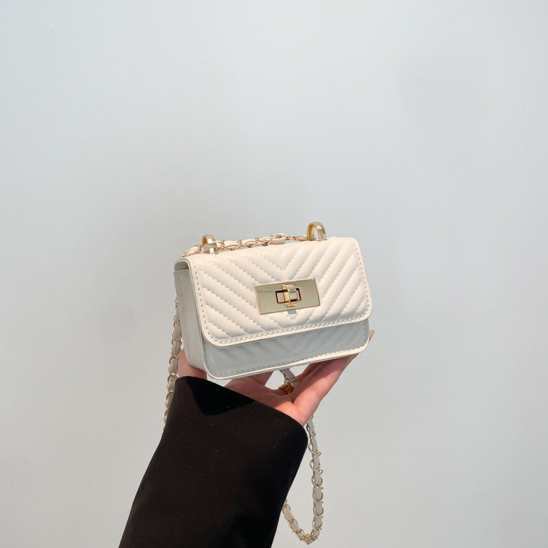 Damen Mini-Handtasche mit gestepptem Design und goldenem Verschluss Nord Taschen