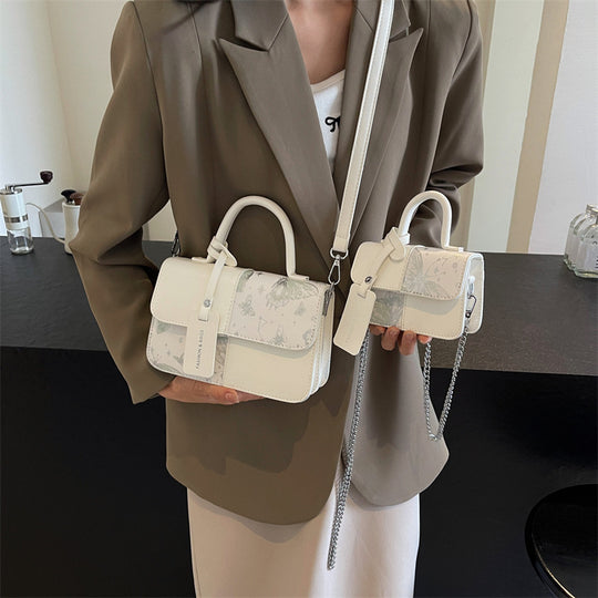 Damen elegante Umhängetasche mit floralem Design und modischen Akzenten Nord Taschen