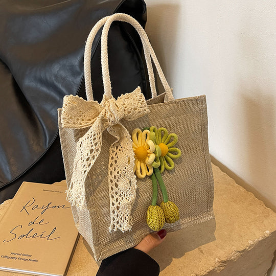 Damen Jute-Tasche mit dekorativer Blumenapplikation und verspieltem Schleifenverschluss Nord Taschen