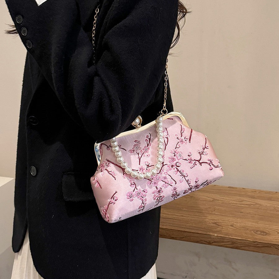 Damen elegante Clutch mit floralen Akzenten Nord Taschen