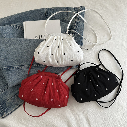 Damen stilvolle Wickeltasche mit floralem Design Nord Taschen