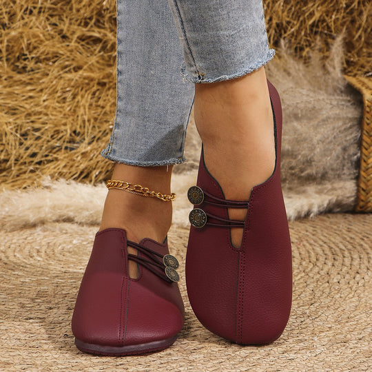 Damen  flache Slipper-Pantoletten aus Wildlederoptik mit elastischer Schnürung und dekorativem Zierknopf Nord Taschen