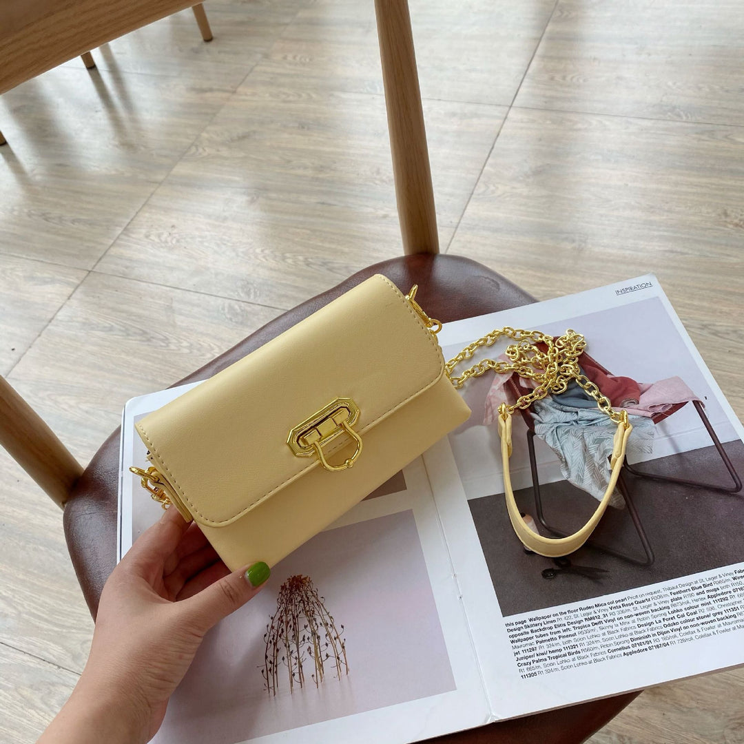 Damen Umhängetasche mit elegantem Kettenriemen und klappbarem Verschluss Nord Taschen