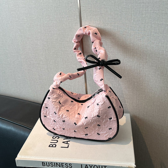 Damen Umhängetasche mit innovativer Schulterriemenstruktur und floralem Design Nord Taschen