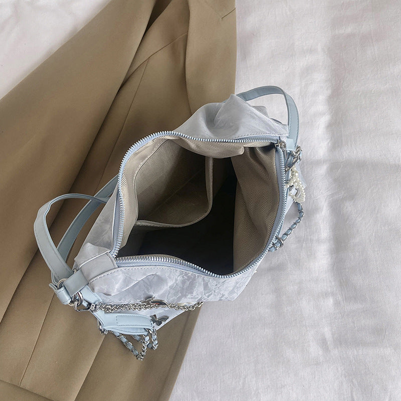 Damen Schultertasche mit modischen Ketten- und Perlendetails | Nord Taschen
