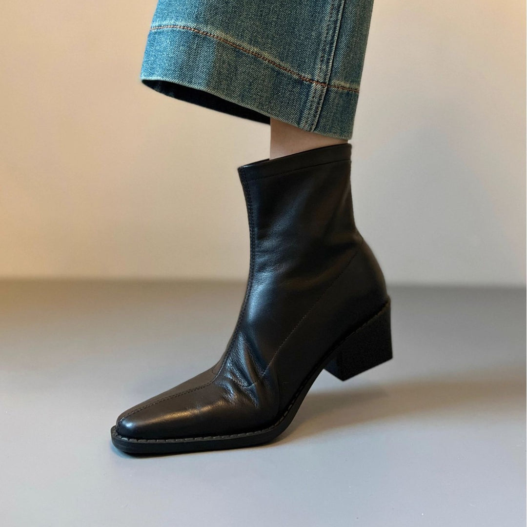 Damen Knöchelhohe Glattleder‑Stiefelette mit sculpted Keilabsatz Nord Taschen