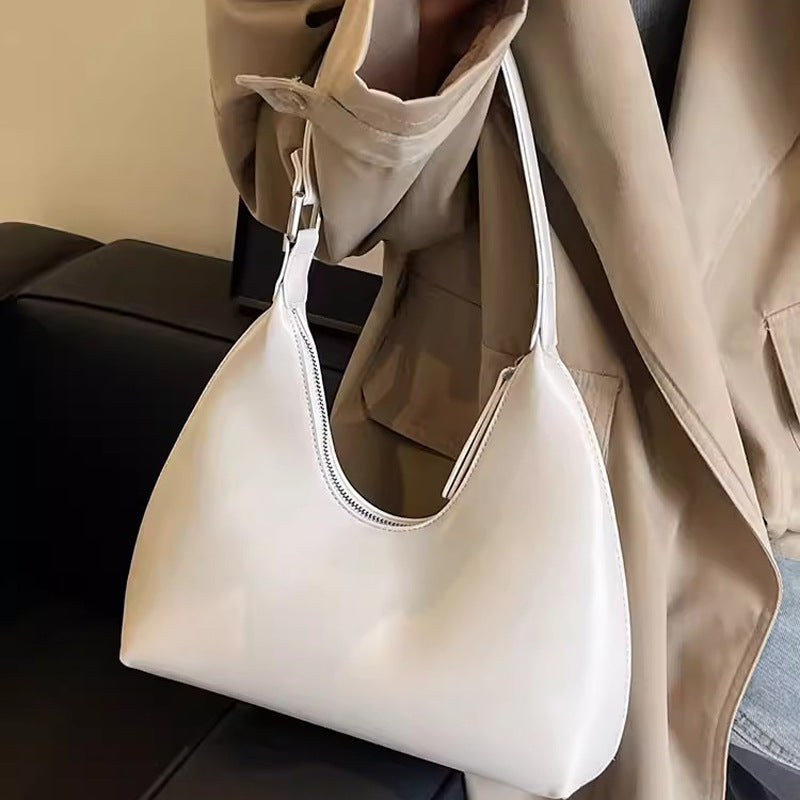 Damen Hobo-Tasche mit elegantem, geschwungenem Design und hochwertiger Oberfläche Nord Taschen