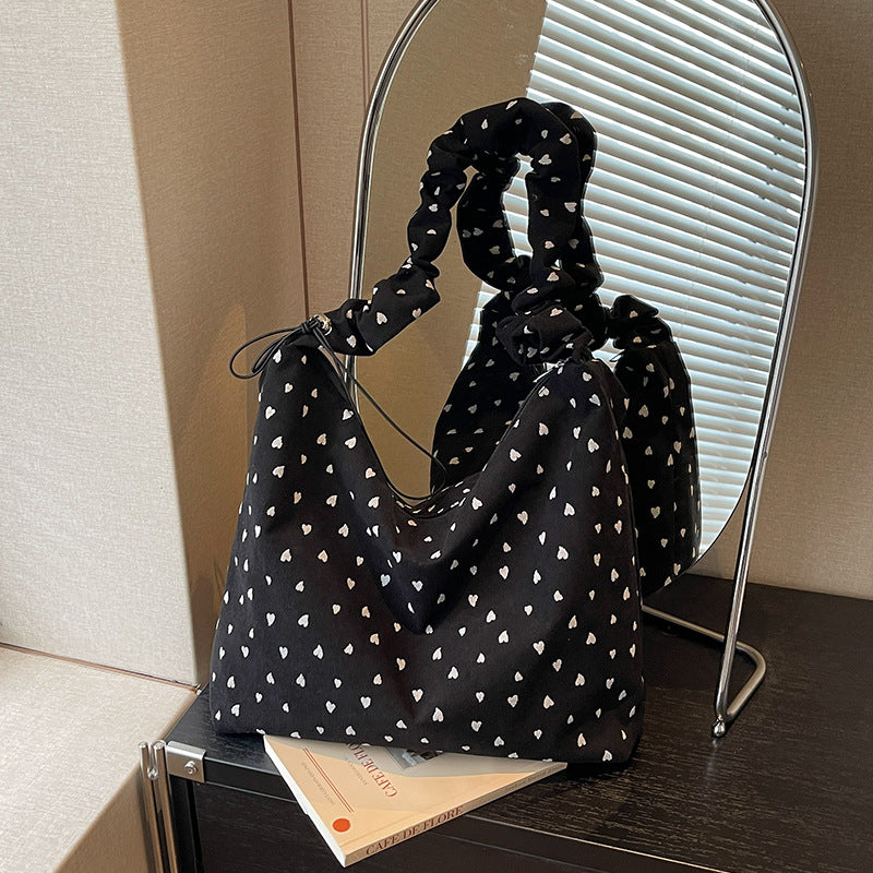Damen Hobo-Tasche mit verspieltem Herzdesign und elastischen Trageriemen Nord Taschen