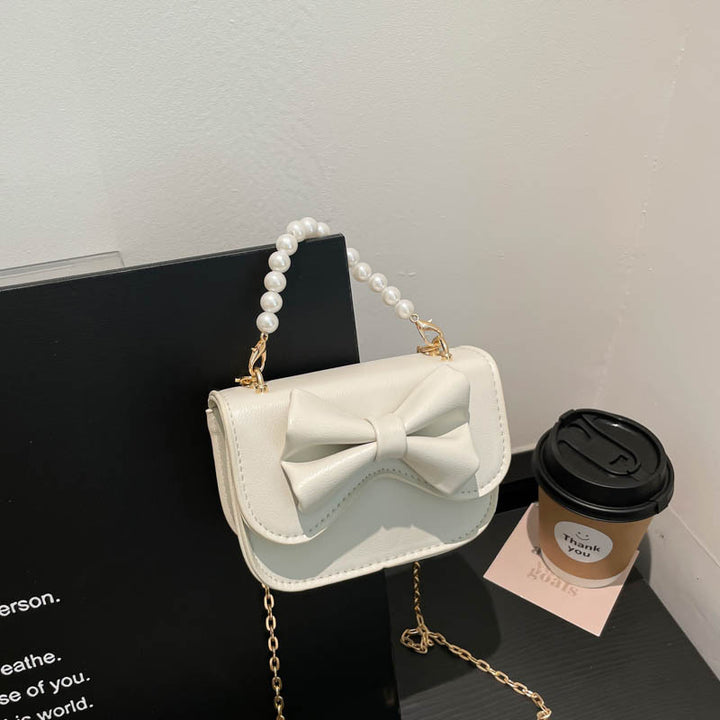 Damen Handtasche mit elegantem Schleifendetail und Perlenhenkel Nord Taschen