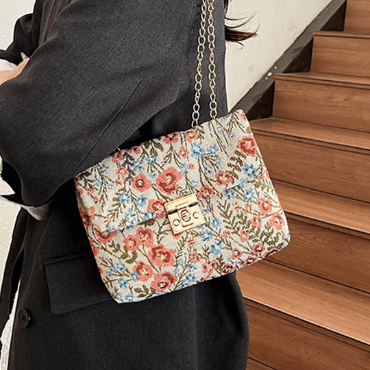 Damen Clutch-Tasche mit floralem Stoffdesign und goldener Kettenverzierung Nord Taschen