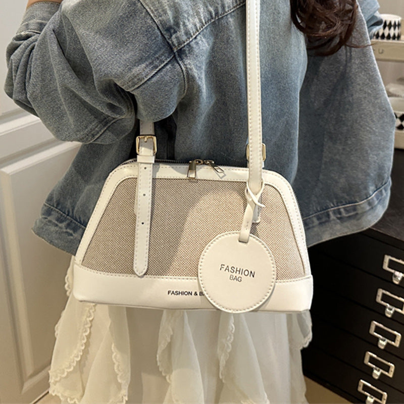 Damen Umhängetasche mit strukturiertem Gewebe und elegantem Detail Nord Taschen