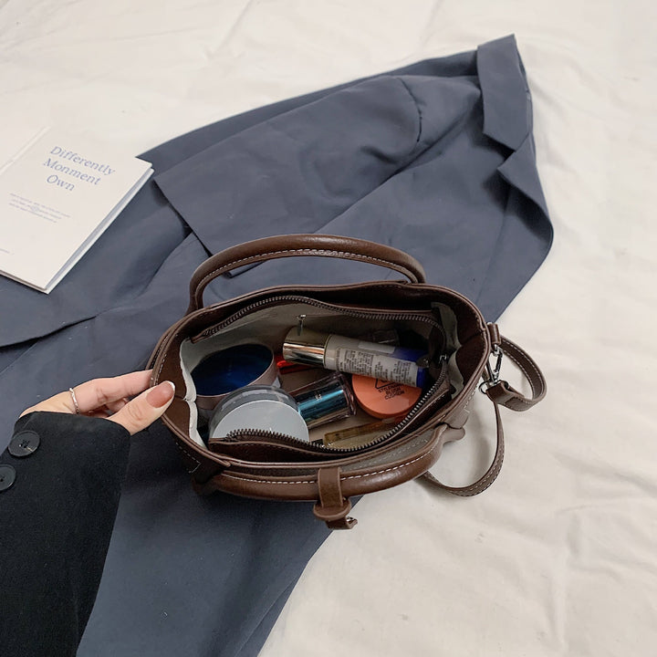 Damen elegante Handtasche mit feinem Leder und strukturiertem Design Nord Taschen