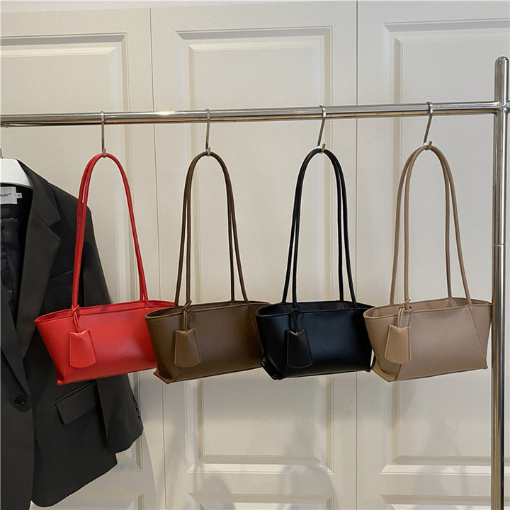 Damenhandtasche mit minimalistischer Silhouette und eleganten Details Nord Taschen