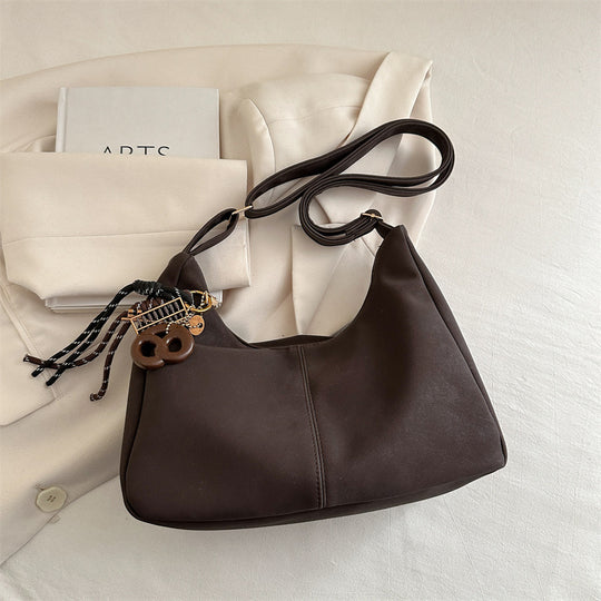 Damen Schultertasche mit modischem Anhänger Nord Taschen