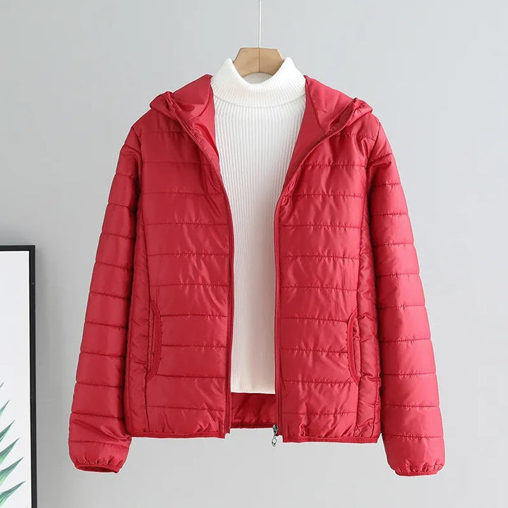 Damen gesteppte Übergangsjacke mit praktischen Taschen und Kapuze