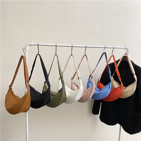 Damen praktische Umhängetasche mit geschwungenem Design Nord Taschen