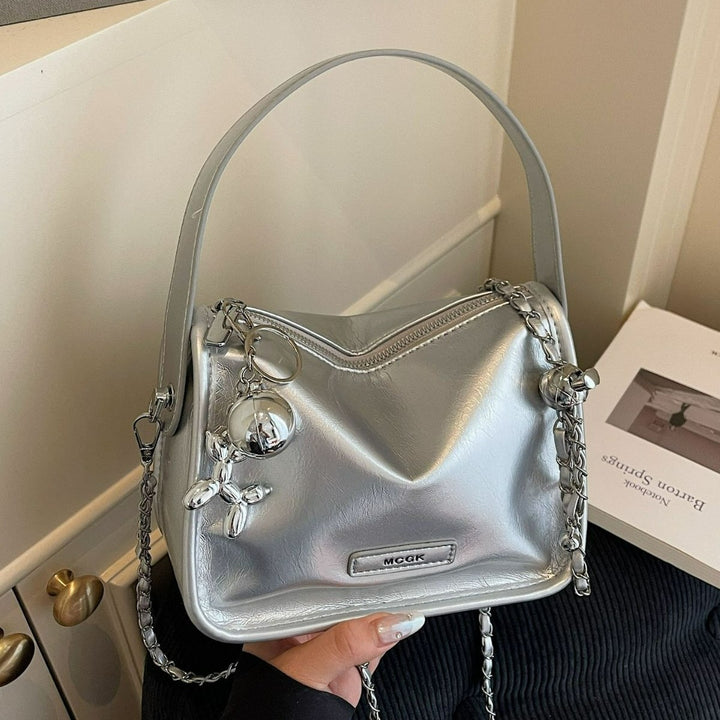 Damen Schultertasche mit glänzendem Metalliceffekt Nord Taschen