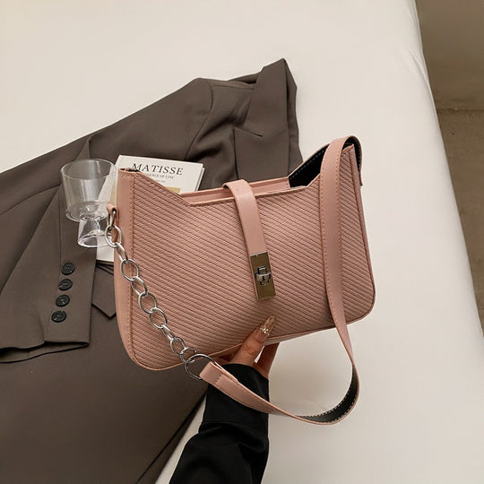 Damen stylische Umhängetasche mit geprägtem Design und dekorativer Kettenverzierung Nord Taschen