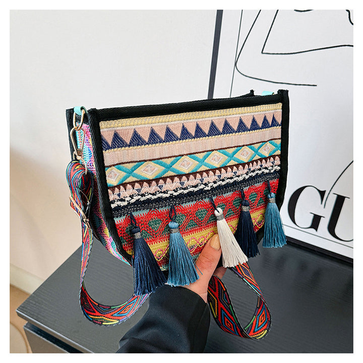 Damen umhängetasche mit kreativem Stickmuster und Quasten Nord Taschen