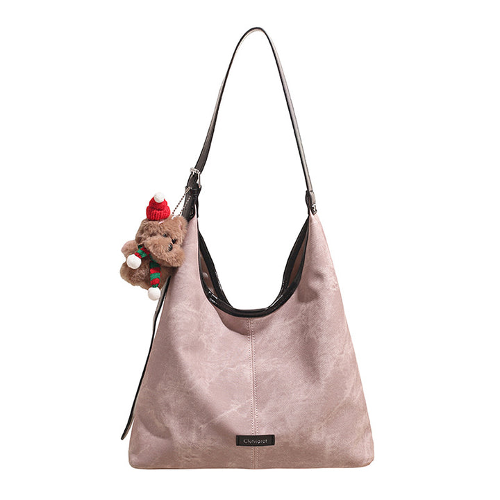Damen Hobo-Tasche aus weichem Veloursleder mit charmantem Anhänger Nord Taschen