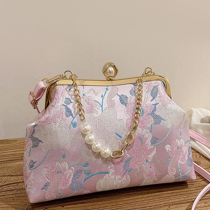 Damen elegante Clutch-Tasche mit floralem Motiv und exklusiver Kettenverzierung Nord Taschen