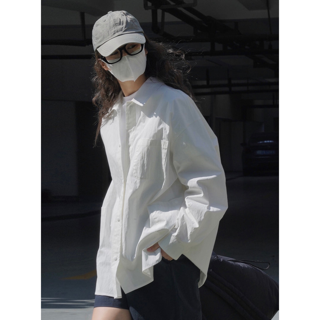 Damen Oversize-Baumwoll-Hemdjacke mit Brusttasche und verlängertem Rückenteil Nord Taschen
