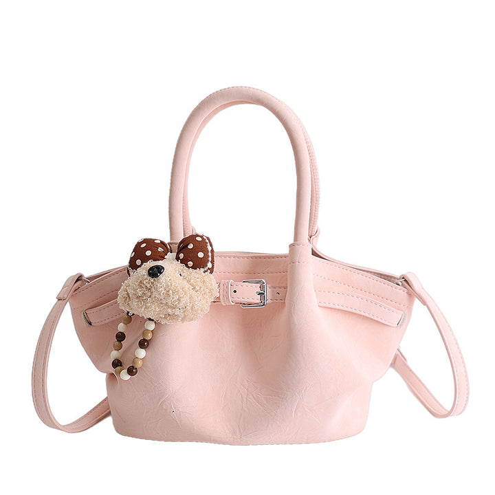 Damen elegante Handtasche mit verspieltem Tieranhänger Nord Taschen