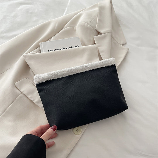 Damen stilvolle Clutch-Tasche aus strukturiertem Material Nord Taschen