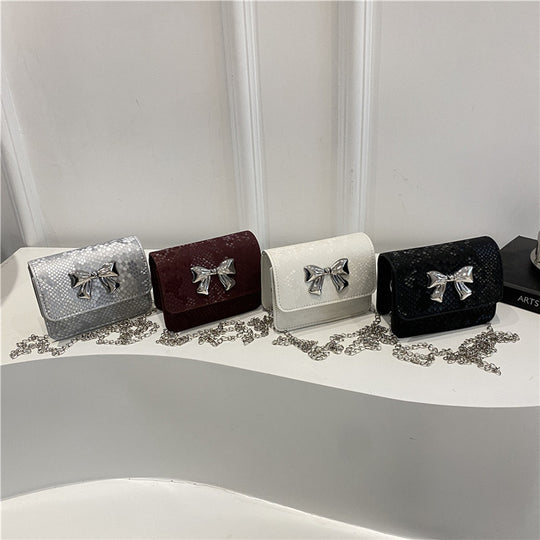 Damen Clutch mit verspieltem Schleifendesign Nord Taschen