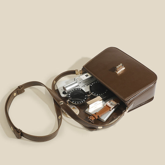 Damen Crossbody-Tasche mit elegantem Drehverschluss und feinem Kunstleder Nord Taschen
