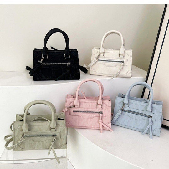 Damen stilvolle Handtasche mit dekorativem Reißverschluss Nord Taschen