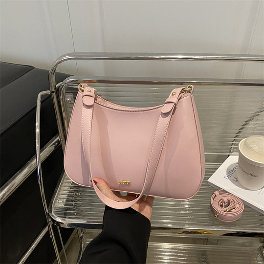 Damen elegante Umhängetasche mit geschwungenem Design und abnehmbarem Riemen Nord Taschen
