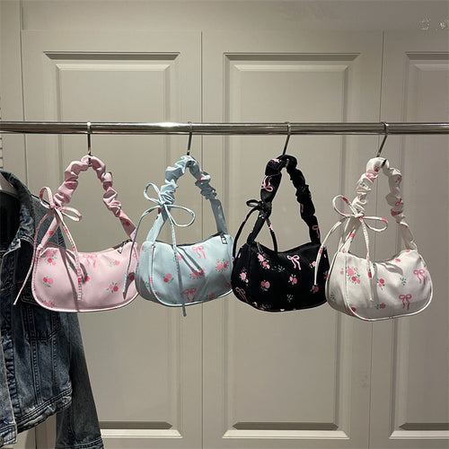 Damen modische Abendtasche mit verspielten Rüschen und floralen Akzenten Nord Taschen