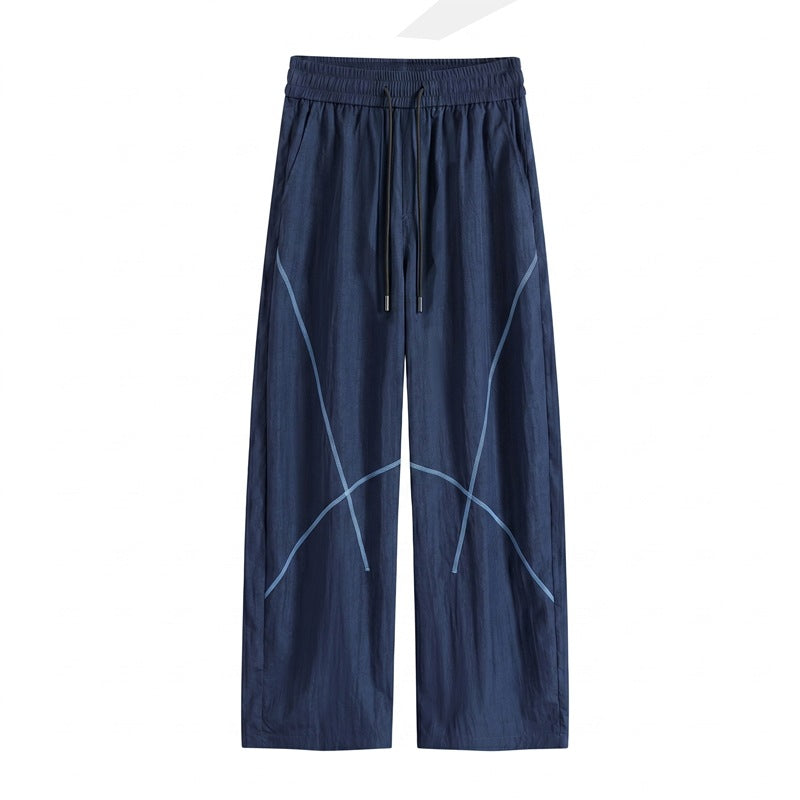 Herren Weite Funktions-Nylonhose mit Kordelbund, reflektierenden Nahtdetails & lässiger Baggy‑Silhouette Nord Taschen