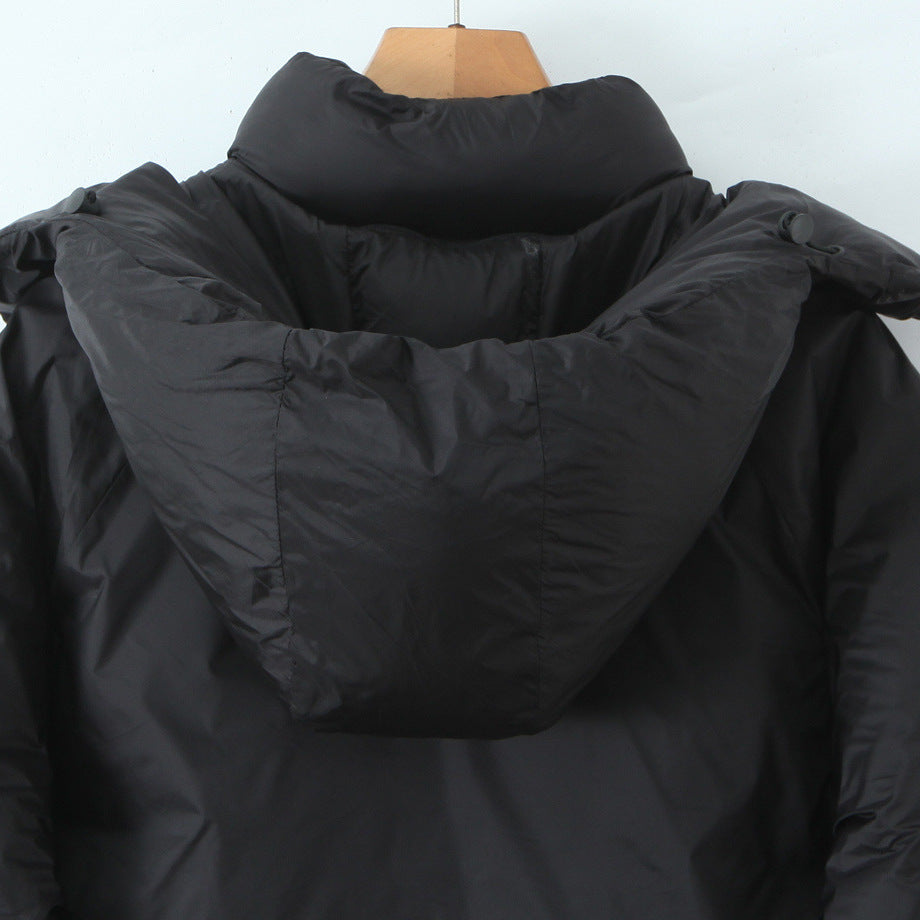 Damen Kurze boxy Funktionsjacke mit Kapuze, wattierter Isolierung und diagonalen Reißverschlusstaschen Nord Taschen