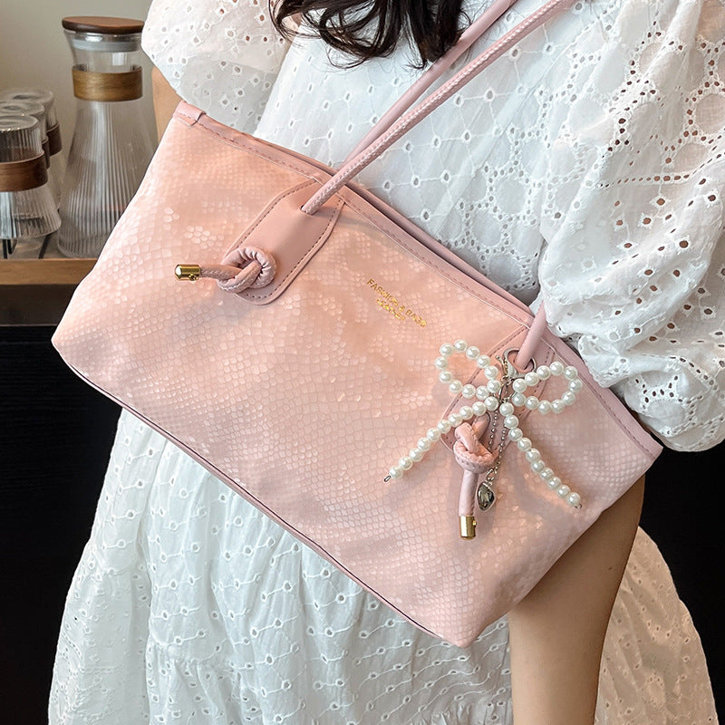 Damen elegante Handtasche mit magnetischem Verschluss und stilvollen Kordelzügen Nord Taschen