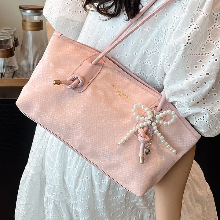 Damen elegante Handtasche mit magnetischem Verschluss und stilvollen Kordelzügen Nord Taschen