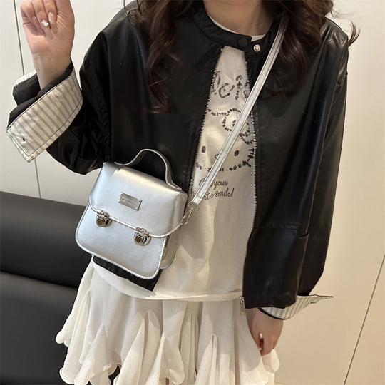 Damen praktische Crossbody-Rucksackhandtasche mit stilvollen Metallakzenten Nord Taschen