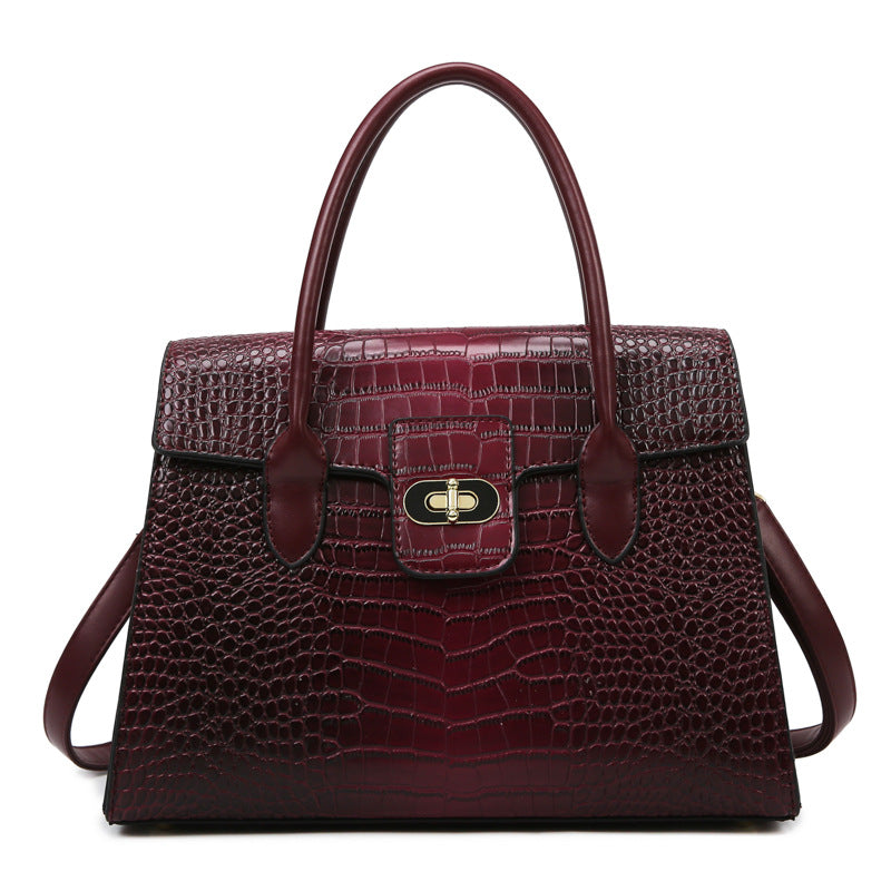 Damen elegante Handtasche mit Struktur und goldener Schnalle Nord Taschen