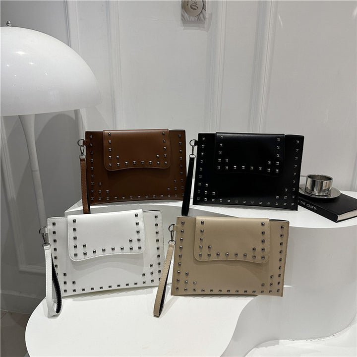 Damen elegante Clutch mit Nietenakzenten Nord Taschen